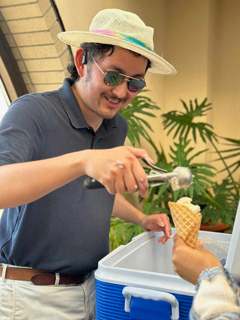 Me serving ice cream and wearing a silly hat